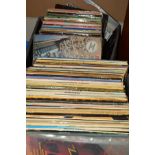 TWO TRAYS OF OVER 300 L.P'S, by artists such as Bill Haley, Tom Jones, Eddie Cochran, etc