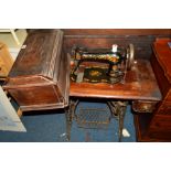 A VICTORIAN SINGER TREADLE SEWING MACHINE