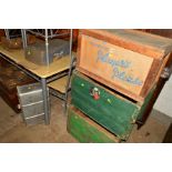 TWO LARGE GREEN PACKING CRATES WITH TRAVEL LABELS, three various other crates, tin trunk and an