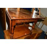 A REPRODUCTION OAK DOUBLE DROP END OCCASIONAL TABLE