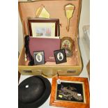 A CREAM LEATHER SUITCASE, containing a fitted brush set, together with Cash's silk pictures, a