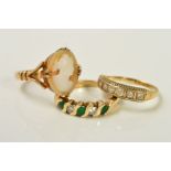 THREE RINGS, the first an oval cameo ring, the second a five stone emerald and cubic zirconia