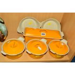 LE CREUSET PANS, to include three small yellow covered casserole dishes, diameter approximately 14.