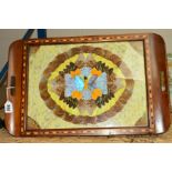 AN ART DECO TEA TRAY, the frame having inlaid and parquetry geometric border, the central glazed