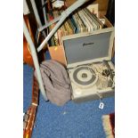 A PORTADYNE RECORD PLAYER, (sd), with box of various records and a Clasico guitar (sd)