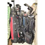 FOUR VARIOUS GOLF BAGS with various clubs including Ping, Taylor Made, etc