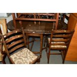 A CARVED OAK DROP LEAF DINING TABLE and four chairs (5)