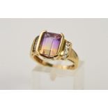 A 9CT GOLD AMETRINE AND ROCK CRYSTAL RING, designed as a central rectangular ametrine flanked by a