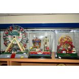 THREE NOVELTY MUSICAL CHRISTMAS FERRIS WHEELS, to include Maisto 'Winter Wonder Wheel', and two