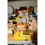 A GROUP OF NOVELTY TEAPOTS, STORAGE JAR ETC, to include Only Fools and Horses 'Trotter's Van', '