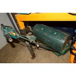 A QUALCAST SUFFOLK PUNCH PETROL CYLINDER LAWN MOWER and grass box