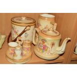A FIELDINGS CROWN DEVON THREE PIECE CRUET SET AND STAND, together with matching a teapot, biscuit