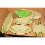 CLARICE CLIFF FOR NEWPORT POTTERY DISHES, to include a pair of corn on the cob dishes, length