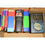 ROWLING J.K, a set of seven Harry Potter books, first two in paperback the rest hardback with dust