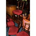 A SET OF SIX EDWARDIAN MAHOGANY DINING CHAIRS with red overstuffed seat pads