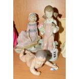 THREE VARIOUS FIGURES, to include a Lladro figure 'Spring' No.5217, designer Juan Huerta, height