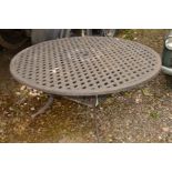 A CIRCULAR ALUMINIUM LATTICE TOPPED GARDEN TABLE, diameter 152.5cm x height 72cm