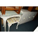 A PAINTED KIDNEY DRESSING TABLE with a single drawer and a stool, together with a painted three door