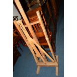 A BEECH ARTISTS EASEL, together with a modern easel (2)