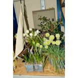 A MODEL SAIL BOAT, mounted on a stand together with a wicker basket and various ornamental flower