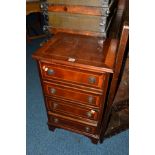 A MODERN MAHOGANY CHEST OF FOUR DRAWERS