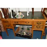 AN EARLY 20TH CENTURY WALNUT LADIES KNEE HOLE DESK, the top with green leather inlaid top, five