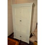 A MODERN WHITE PAINTED DOUBLE DOOR WARDROBE/CUPBOARD, above two cupboard doors, width 105cm x