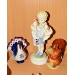 A ROYAL WORCESTER FIGURE, 'Monday's Child is Fair of Face' (boy), a USSR Turkey, height 9cm and a
