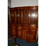 A BEVAN FUNNELL REPRODUX FLAME MAHOGANY BREAKFRONT SECRETAIRE BOOKCASE, the top with four glazed