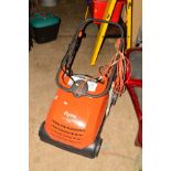 A FLYMO COMPACT 3400 ELECTRIC LAWN RAKE