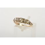 AN EARLY 20TH CENTURY DIAMOND HALF HOOP RING, five old European cut diamonds, measuring from 3.0mm-