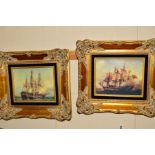A PAIR OF PRINTS ON CANVAS, depicting sailing ships during battle, hand embellished, gilt framed,