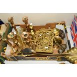 A BOX OF BRASS ITEMS TO INCLUDE, candlesticks, trivits, mortar and pestle, ladles, fire dogs,