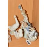 A LLADRO FIGURE GROUP, 'Bashful Bather' No.5455, designer Juan Huerta, together with a Nao Duck, a