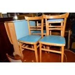 A BLUE FORMICA TOPPED GATE LEG TABLE, together with three similar chairs and two pairs of stools (