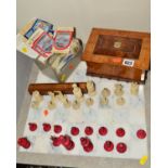 TWO MARBLE CHESS BOARDS, a distressed chess set, a set of stamps (numbers), various souvenir badges,