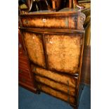 A REPRODUCTION BURR WALNUT TWO DOOR TALL BOY, with four drawers, width 76cm x depth 47cm x height