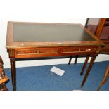 A MID TO LATE 20TH CENTURY MAHOGANY WRITING DESK, with a black tooled leather inlay top, detailed