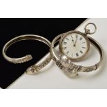 TWO LATE VICTORIAN SILVER BANGLES AND A POCKET WATCH, the bangles of crossover torque design with