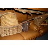 A COLLECTION OF WICKER ITEMS to include four various baskets etc (5)