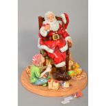 A ROYAL DOULTON FIGURE GROUP, 'Father Christmas 2011' HN5436 (toy soldiers head loose)