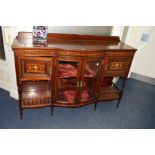 AN EDWARDIAN MAHOGANY AND FLORALLY INLAID SIDEBOARD, with raised back, central bow front above