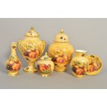 SIX PIECES AYNSLEY 'ORCHARD GOLD', to include twin handled pedestal covered vase, height 23.5cm, a