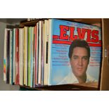 A TRAY OF OVER 80 L.P'S BY ELVIS PRESLEY, including originals and reissues