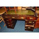 A REPRODUCTION MAHOGANY CAMPAIGN PEDESTAL DESK, with green tooled leather inlay top and nine various