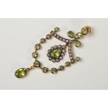 A PERIDOT, SEED PEARL AND DIAMOND PENDANT, of swag openwork design, set with curved row of