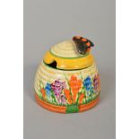 CLARICE CLIFF FOR NEWPORT POTTERY, a 'Crocus' beehive honey pot, printed factory marks, height