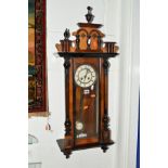 A VICTORIAN WALNUT VIENNA WALL CLOCK, height 85cm (key)