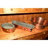 A VICTORIAN COPPER TWIN HANDLED JAM PAN, copper fish kettle and another pan (3)