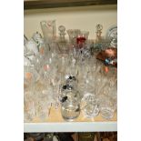 A COLLECTION OF GLASSWARE, including drinking glasses, decanters, vases, carnival glass bowl etc (